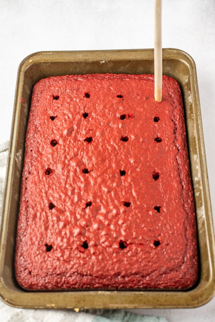 photo of cake with holes poked in it