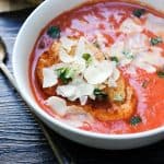 20-MINUTE CREAMY TOMATO BASIL SOUP is a classic comfort food and the is best tomato soup, thanks to 2 secret ingredients.