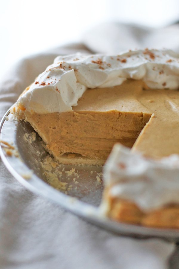 Gingerbread Cream Pie crust with gingerbread cookies flavored filling and whipped cream