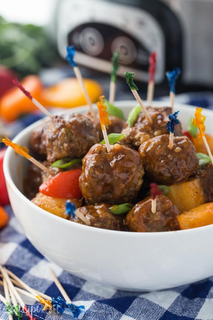 Slow Cooker Meatballs with pineapples peppers and brown sugar