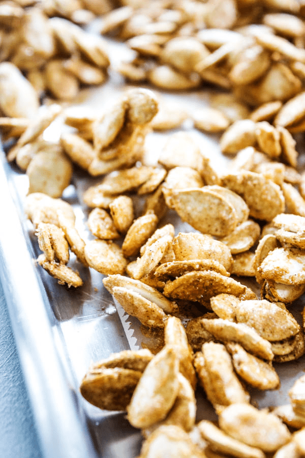 CINNAMON SUGAR PUMPKIN SEEDS are roasted to perfection and is now my favorite Halloween snack.
