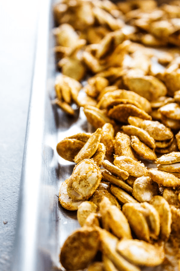 These CINNAMON SUGAR PUMPKIN SEEDS are like mini churros bites, making a great snack for the kids.