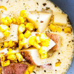 Easy & delicious, this SLOW COOKER POTATO & CORN CHOWDER is the ultimate comfort food. The secret to this chowder recipe is cheese, lots of cheese.