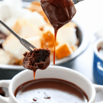 Rich, creamy and decadent this CHOCOLATE PEANUT BUTTER FONDUE recipe is so easy to make and insanely delicious to devour.