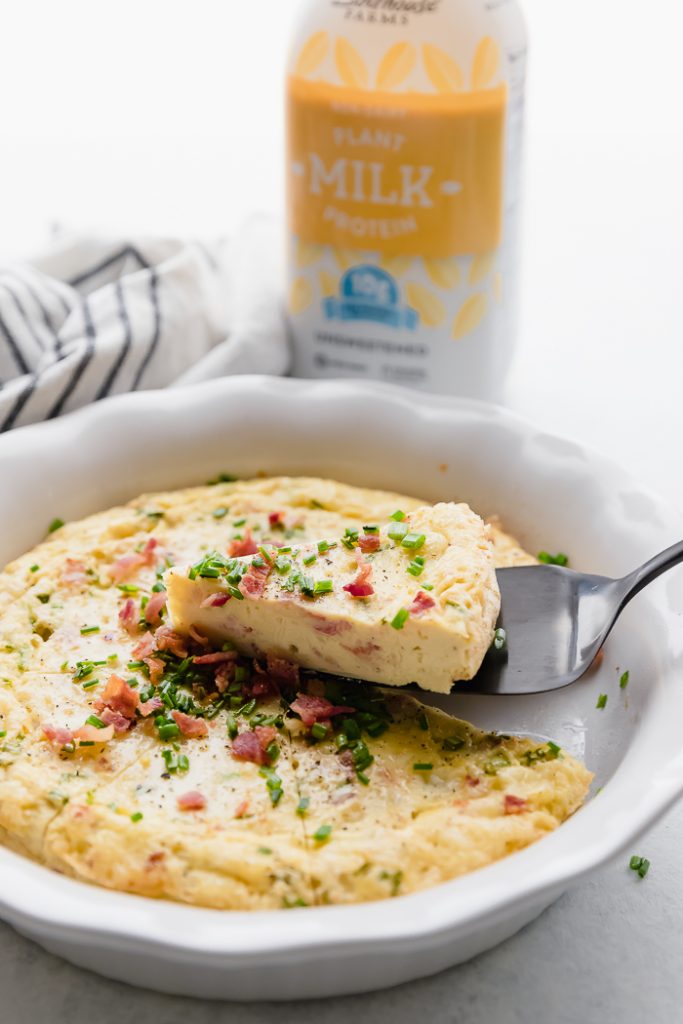 A lightened up recipe on a brunch classic this Bacon Chive Crustless Quiche is simple, easy and delicious. Adding bacon makes everything incredible. A lightened up recipe on a brunch classic this Bacon Chive Crustless Quiche is simple, easy and delicious. Adding bacon makes everything incredible.
